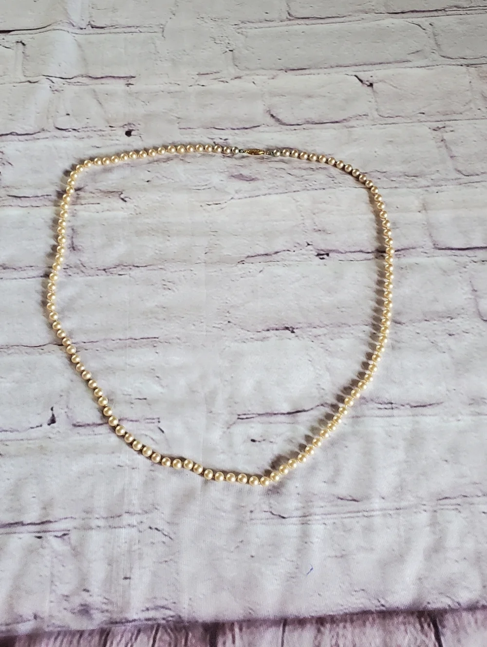 Vintage glass pearl necklace with sterling vermeil filigree clasp and hand knot